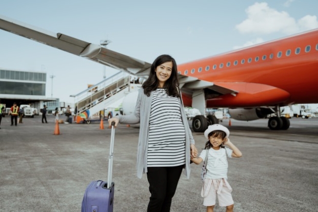 Phụ nữ mang thai đi máy bay AirAsia 